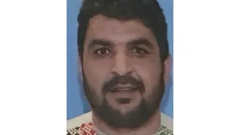 Suspect in National Guard Attack Struggled With 'Dark Isolation' As Community Raised Concerns